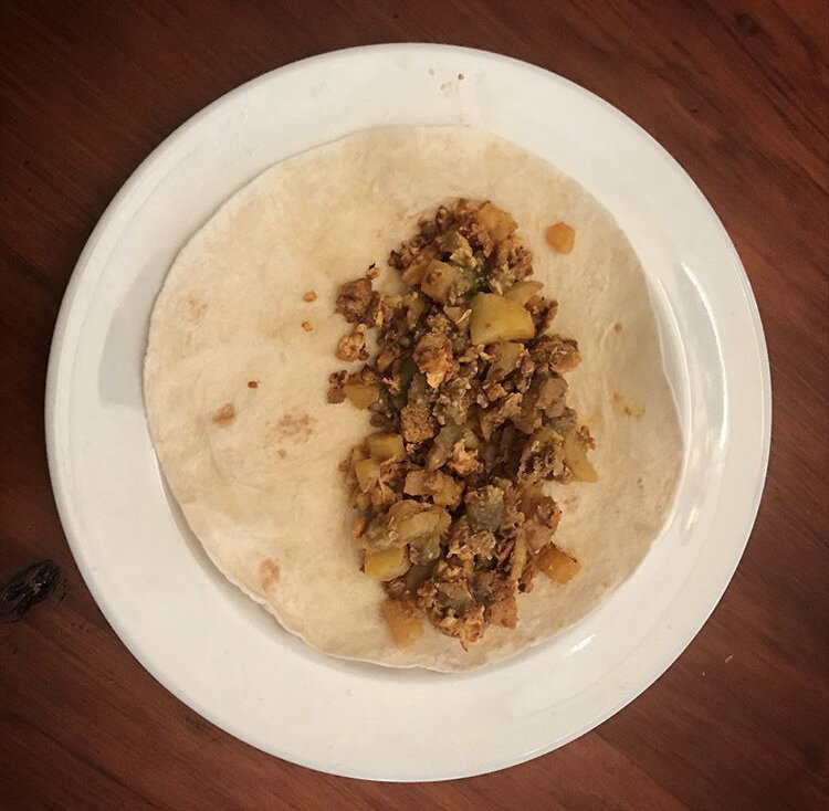Seasoned Potatoes, SOyrizo, eggs, sals, and dark sweet cherry & pineapple smoothie