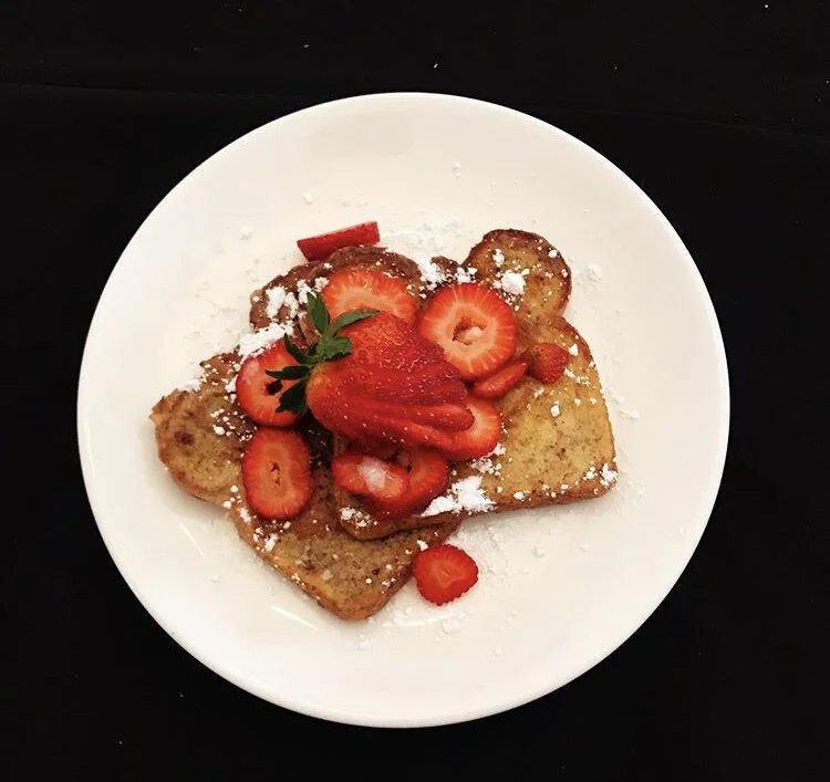 French Toast with Powdered sugar & sliced strawberries