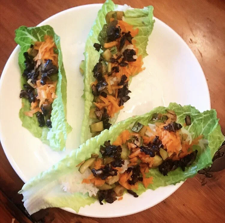 Lettuce Wraps - Mushrooms with poison sauce, carrot shreds, sautéed zucchini, & rice
