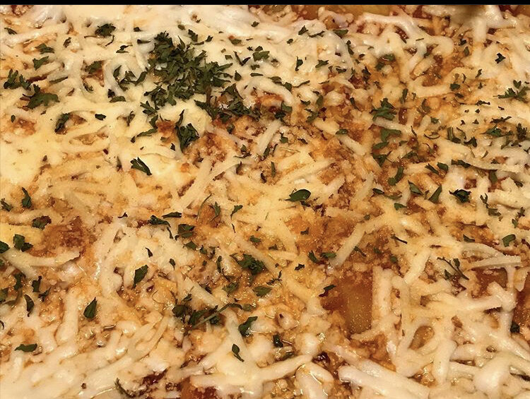 vegetarian Lasagna - Dairy free cheese, minced carrot, cauliflower, broccoli, and marinara sauce (meatless) with a secret blend of herbs and spices 