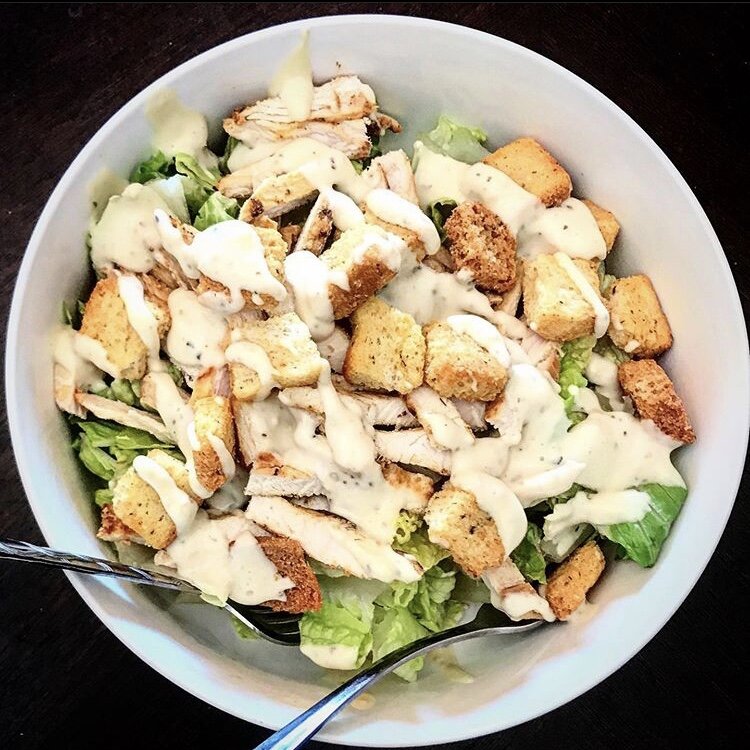 Shredded Chicken, lettuce, croutons, and Casear dressing