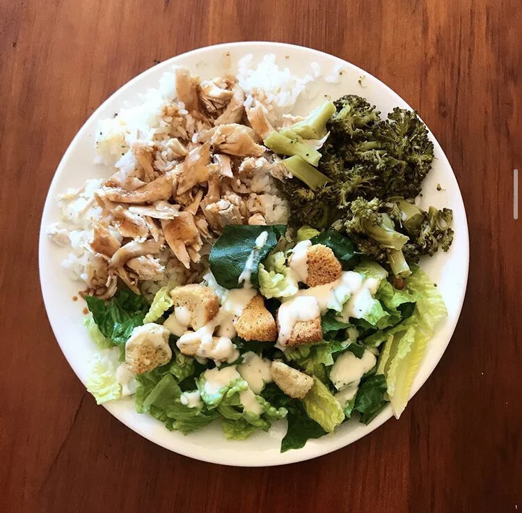 Caesar Salad, Steamed broccoli with lemon, white rice & chicken 