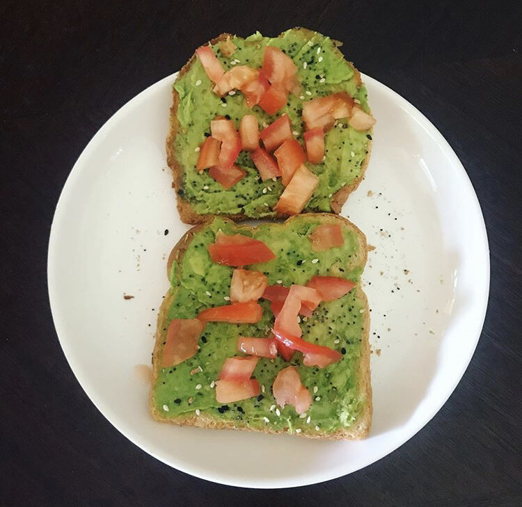 Avocado toast, diced tomatoes, and everything bagel seasoning 