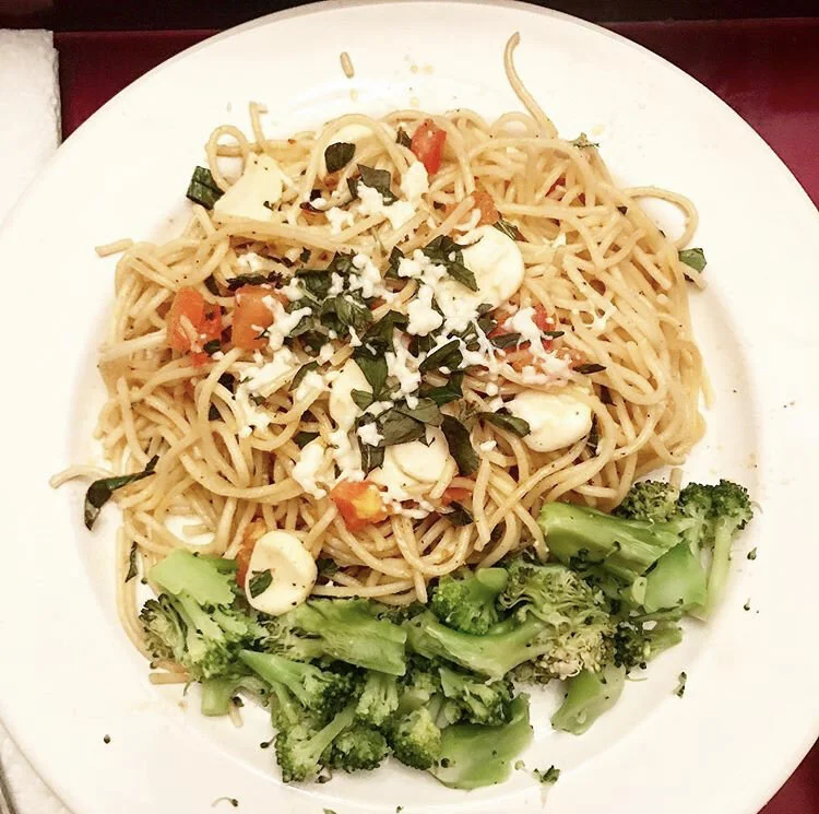 Browned butter spaghetti, mozzarella, sautéed seasoned tomatoes, fresh oregano, and blanched broccoli 