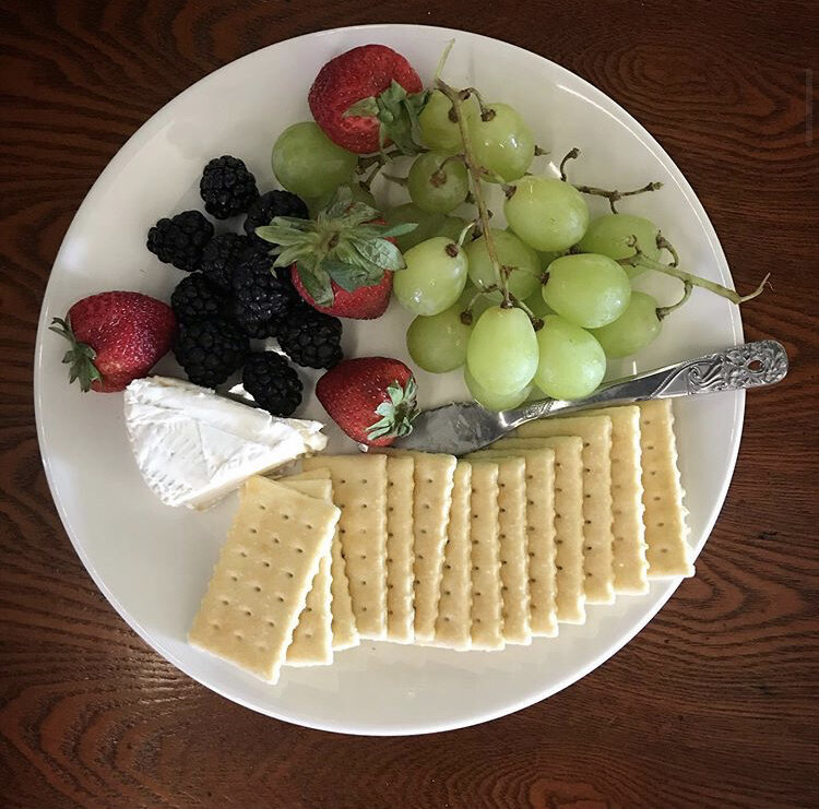Charcuterie - Brie Cheese, crackers, grapes, strawberries, raspberries, & blackberries 