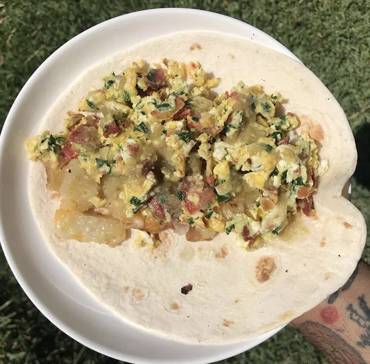 Breakfast Burrito - eggs, vegetarian bacon, potatoes, cheese, spinach, green salsa 