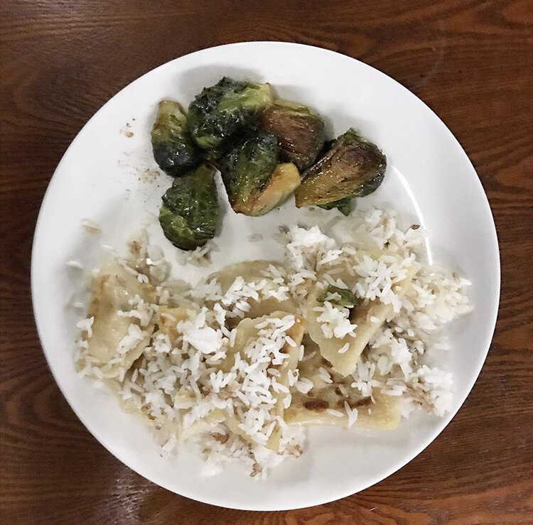 Tofu vegetable dumplings, with rice, and caramelized Brussels sprouts