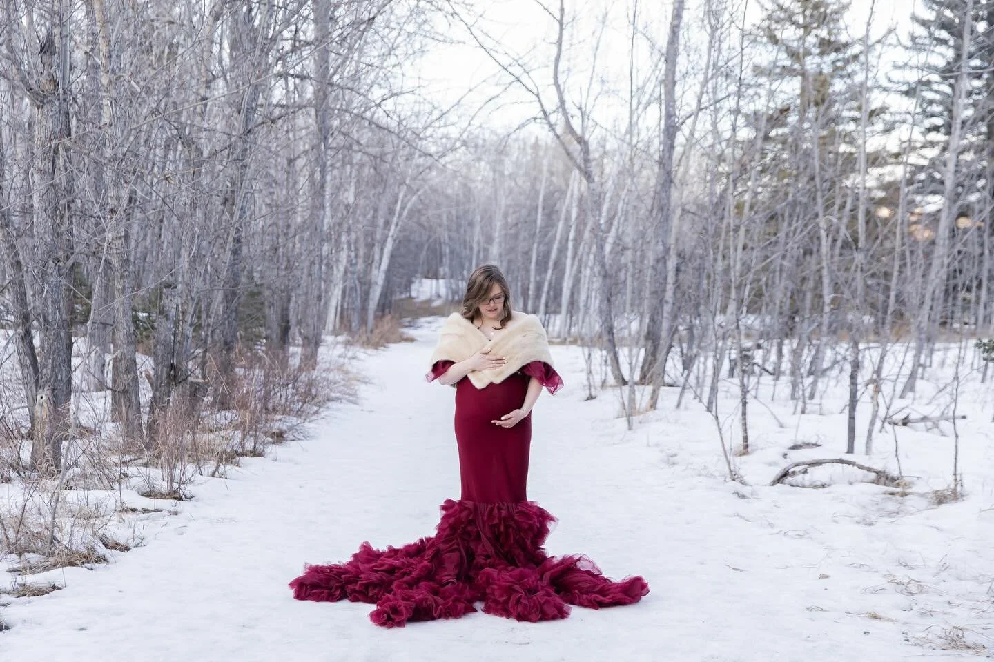 There&rsquo;s no such thing as bad weather, they say, only the wrong clothes.

But when you choose a maternity dress like this, it&rsquo;s always right no matter the weather. 

This mama wanted snow for her calgary maternity session. Who would have t