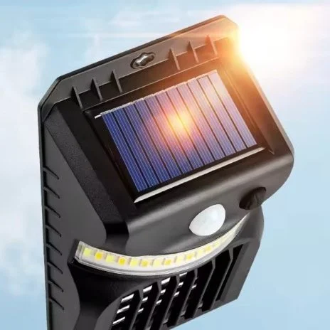 Solar Security Light And Bug Zapper On Blue Sky Background