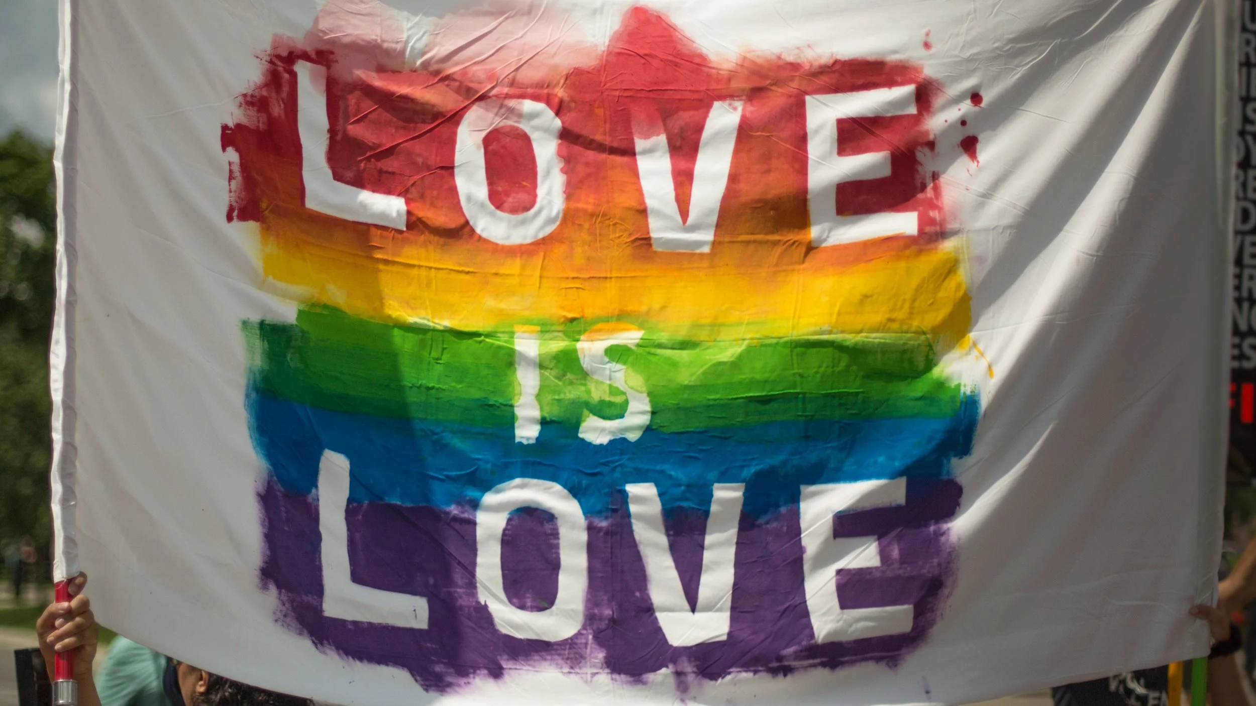 Parents and Students Protest LGBTQ+ Signage Ban