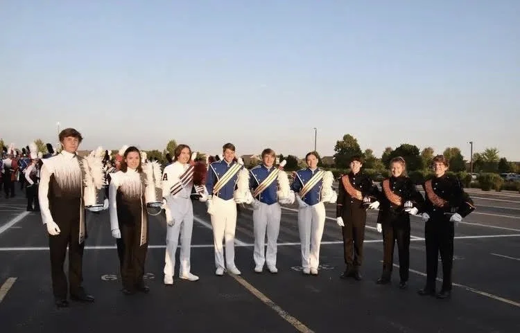 Lehner and Maurer alongside drum majors from Antigo, Germantown, and Cedarburg (left to right).