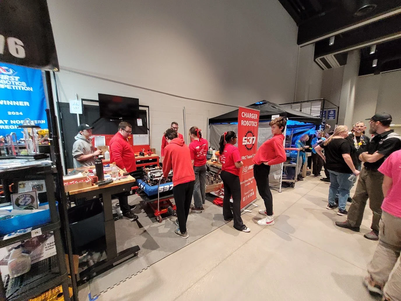 Robot repairs in the pit after a match.