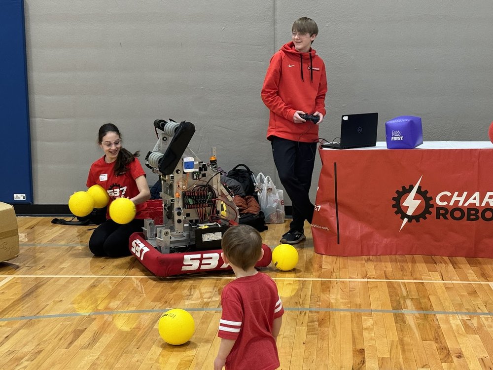 Charger Robotics students run their robot at the HEF Winter Blast.