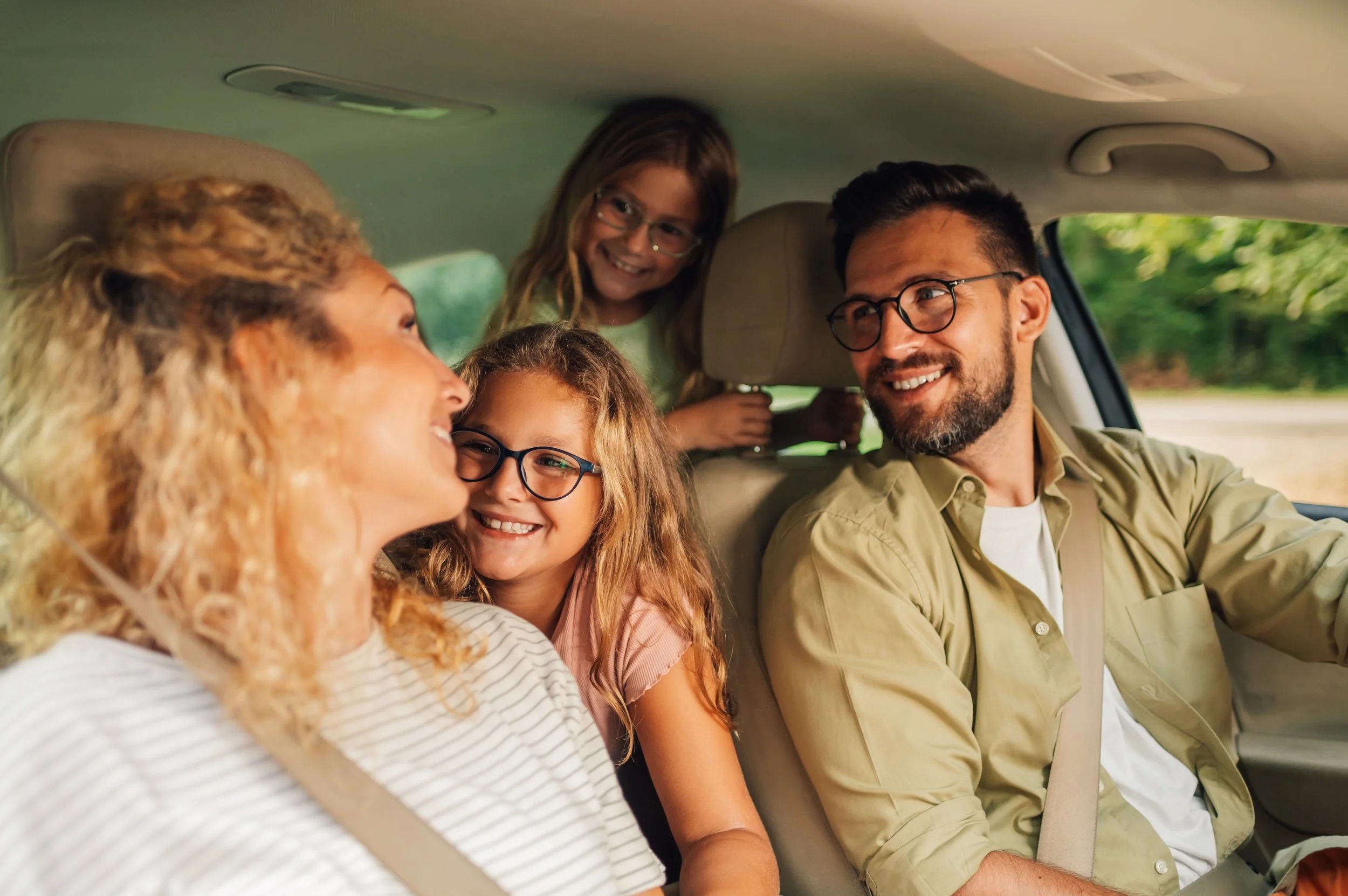 happy-caucasian-family-driving-a-new-car-or-having-2026-01-09-09-09-07-utc.jpg