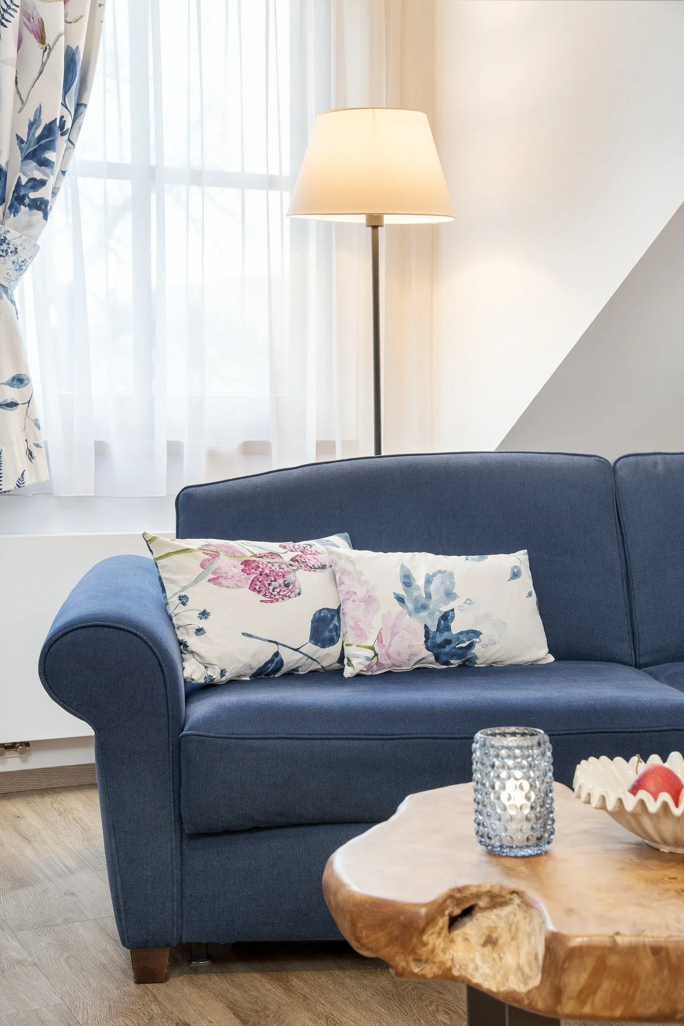 hotel-obermaier-munich-trudering-business-hotel-near-the-trade-fair-superior-suite-for-4-people-with-loft-blue-decor-traditional-bavarian-style-wooden-table-sofa.jpg
