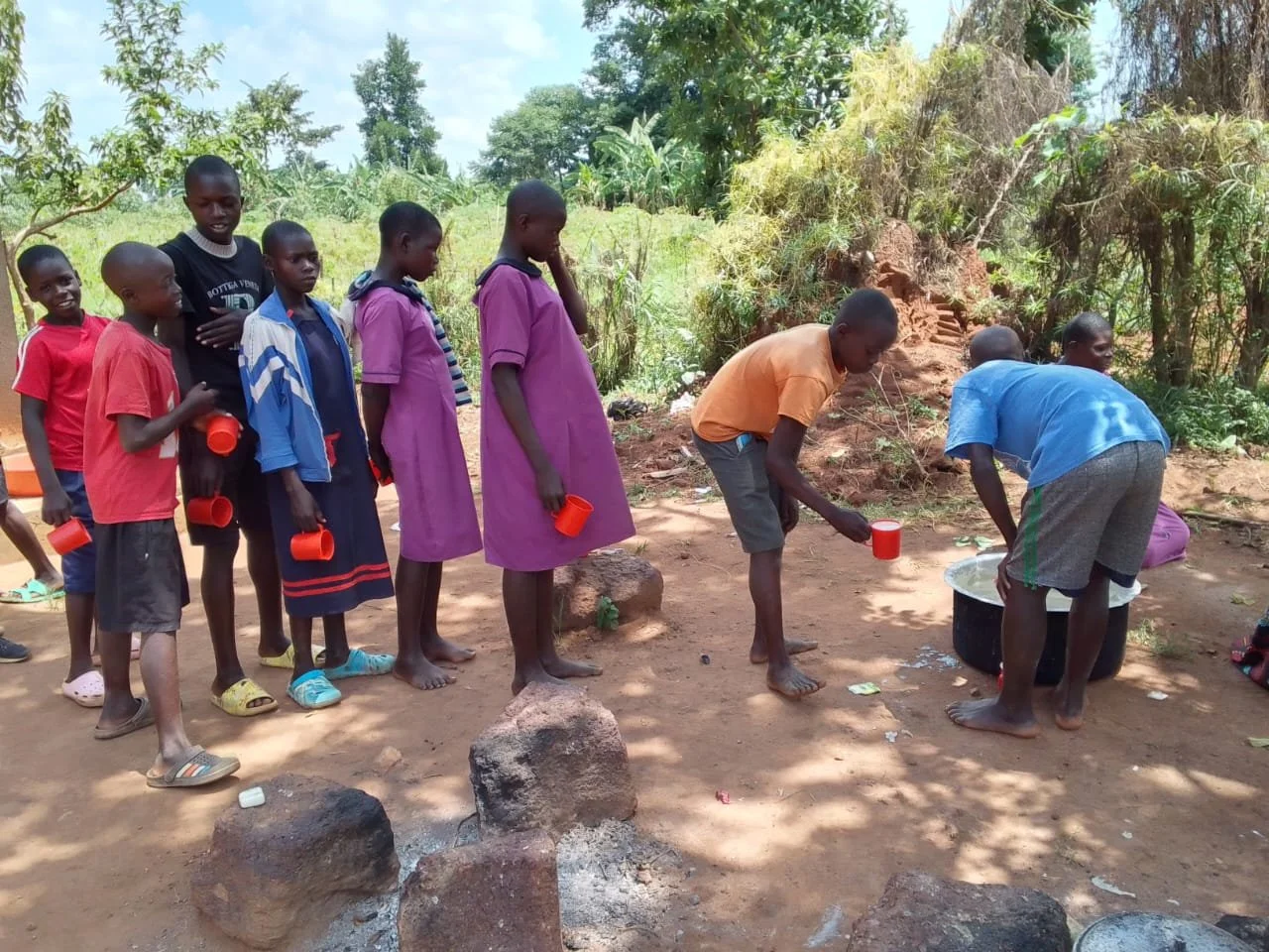 feeding line Uganda.jfif