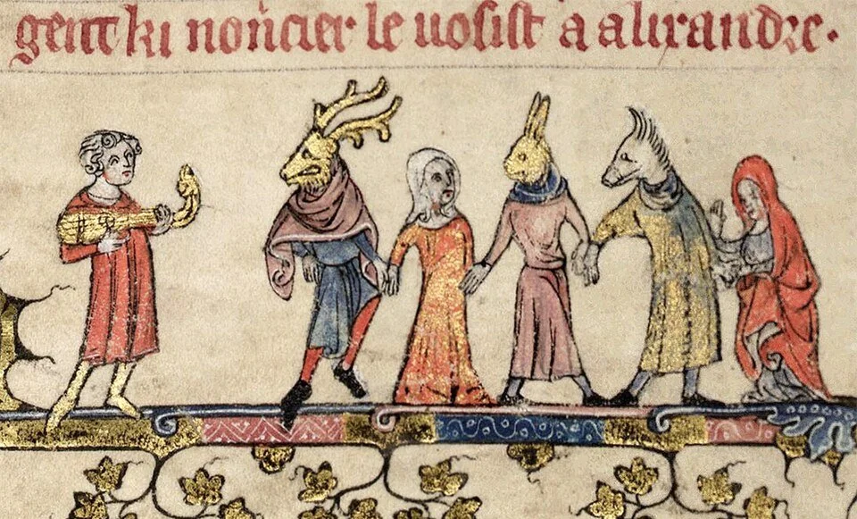 Medieval mummers, from The Romance of Alexander, 14th century. Wikimedia Commons, public domain.