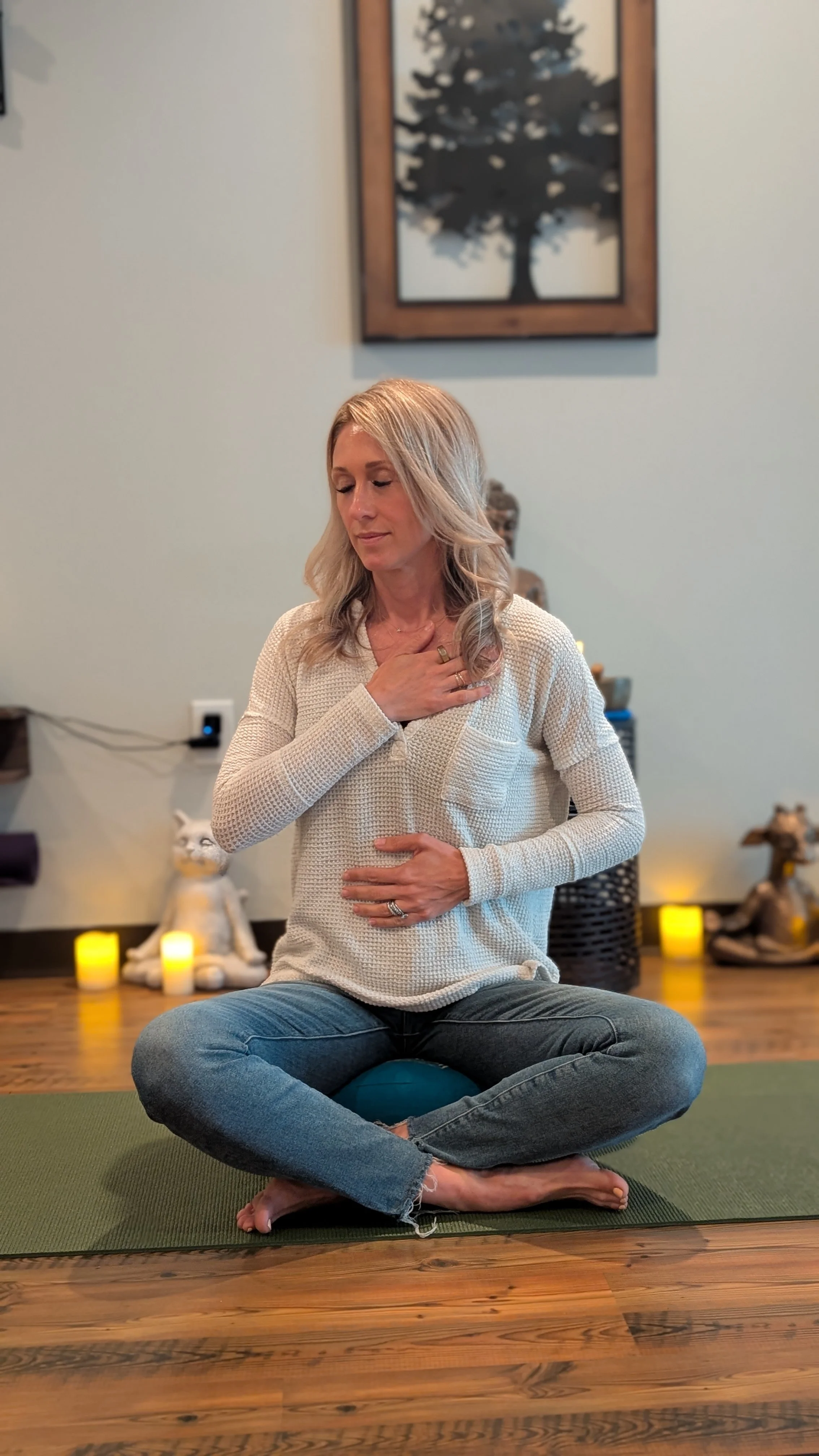 Person Hand Over Heart EFT Tapping Sessions at Emerald Yoga Studio in Pembroke MA