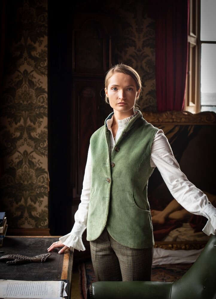 Bella' gilet in sage green corduroy with teal velvet collar and