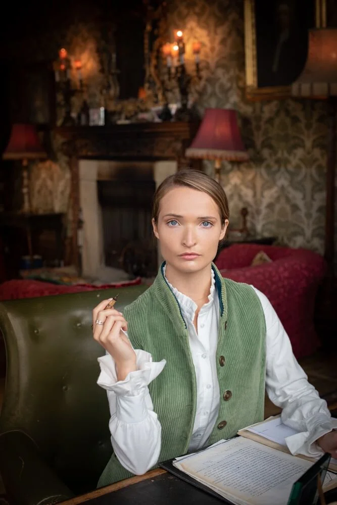 Bella' gilet in sage green corduroy with teal velvet collar and