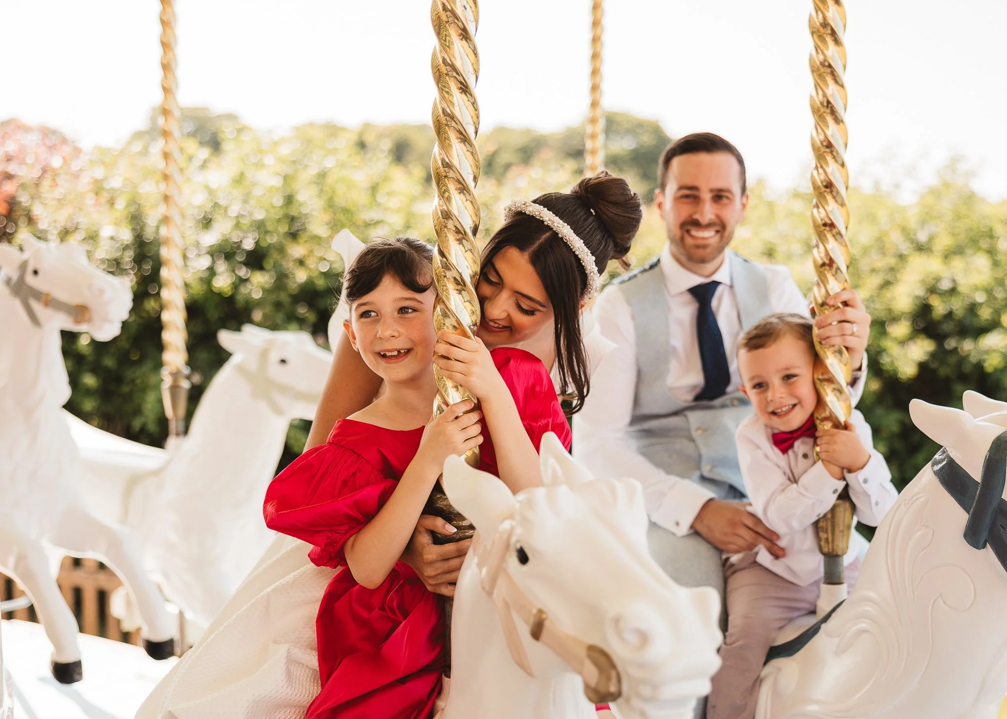  Colourful relaxed Preston Court Wedding Photographer. Carousel ride. 