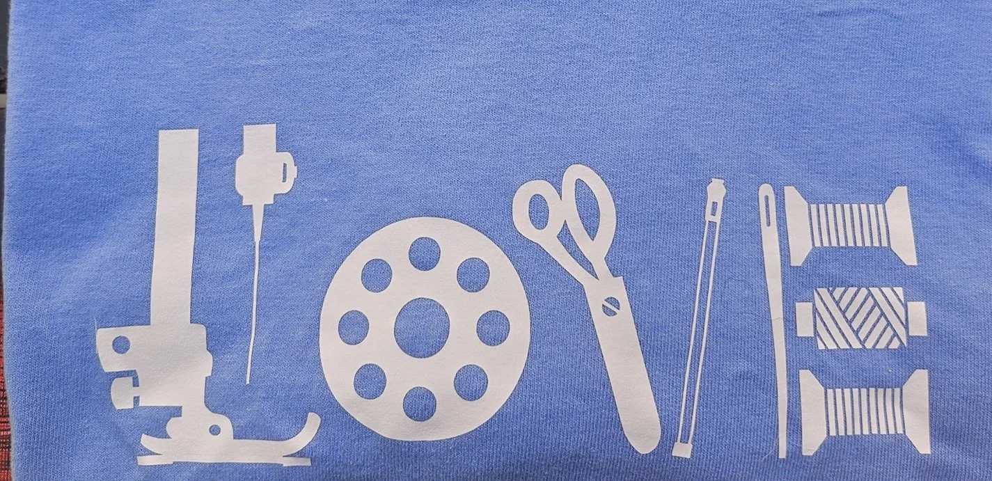 Periwinkle quilter tee shirt gift — LOVE spelled in sewing notions unisex fit