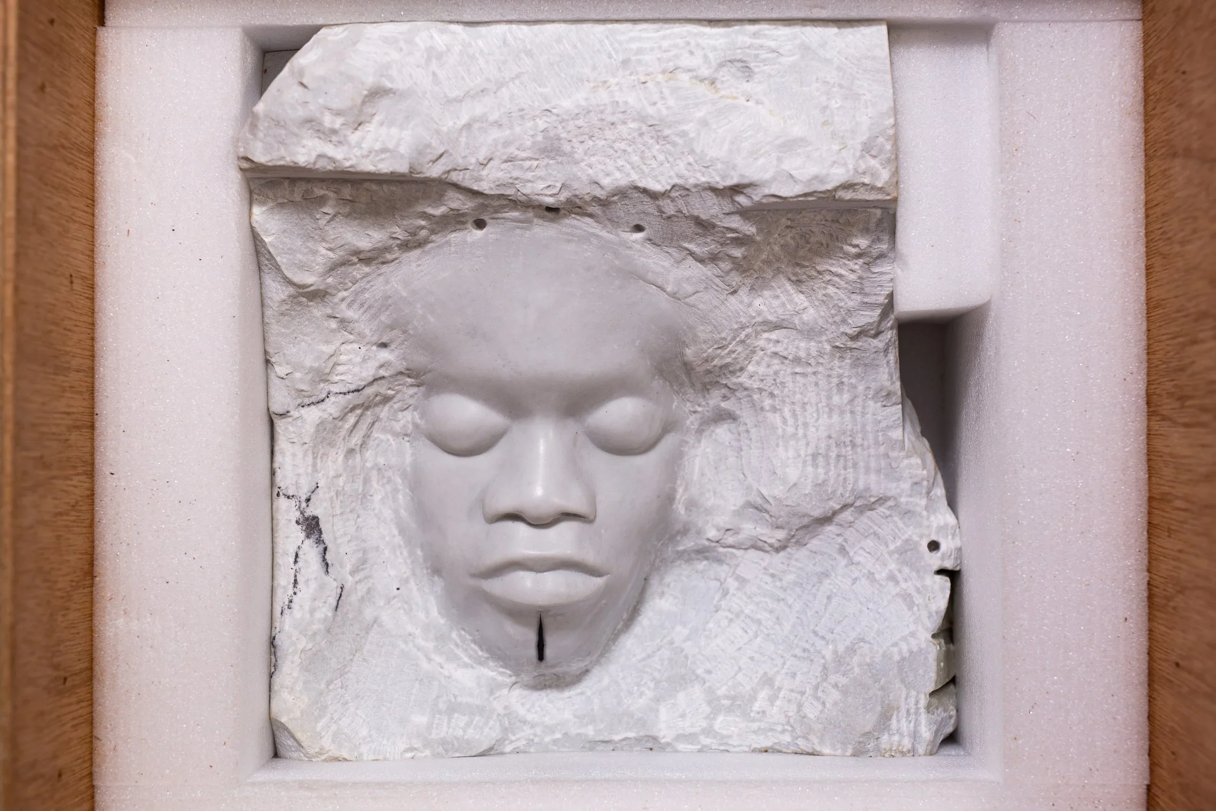 HAMZAT INCORPORATED
black face white stone
marble
12 x 11 x 5 inches