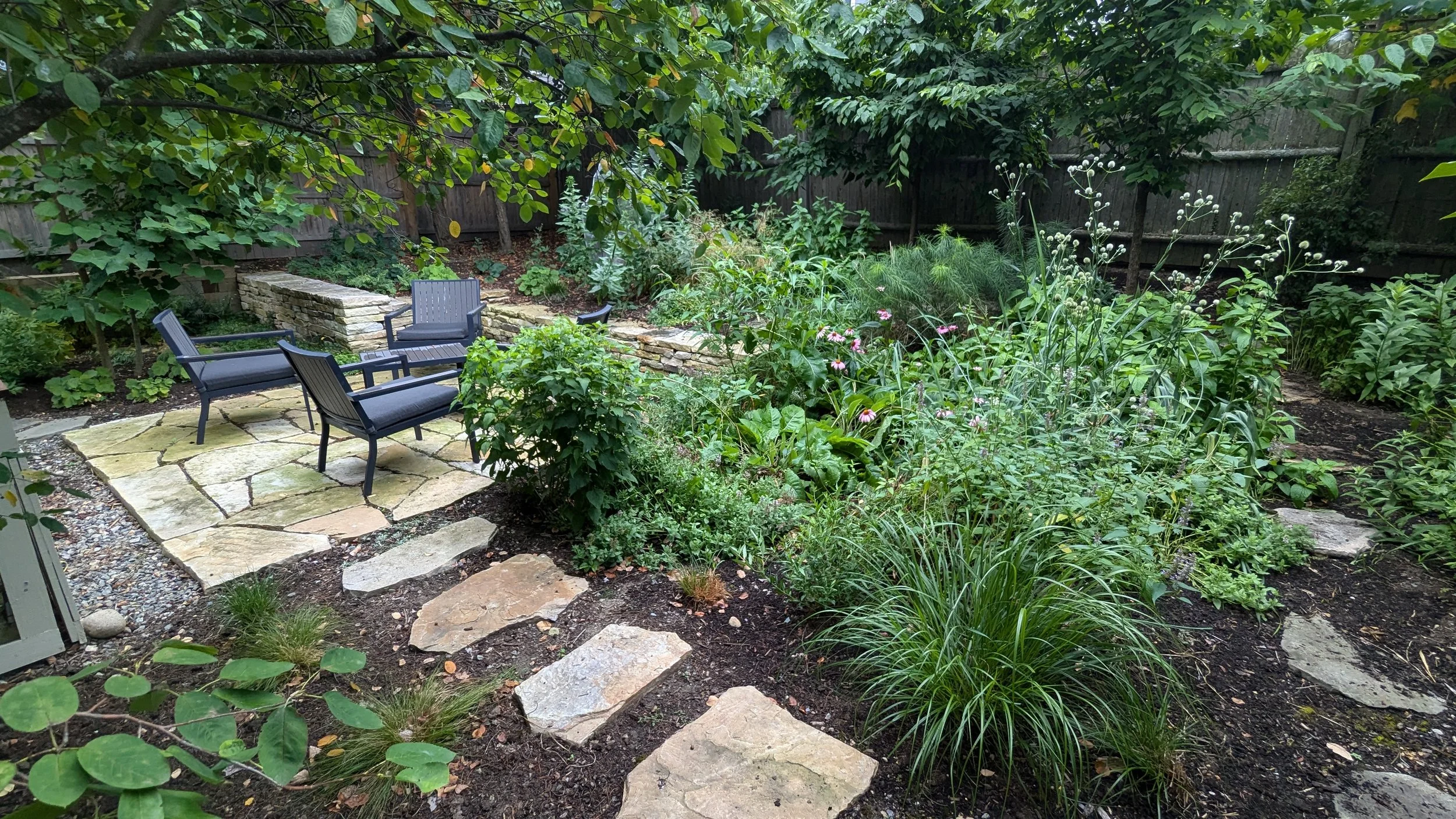 Large steppers invite visitors to the patio.