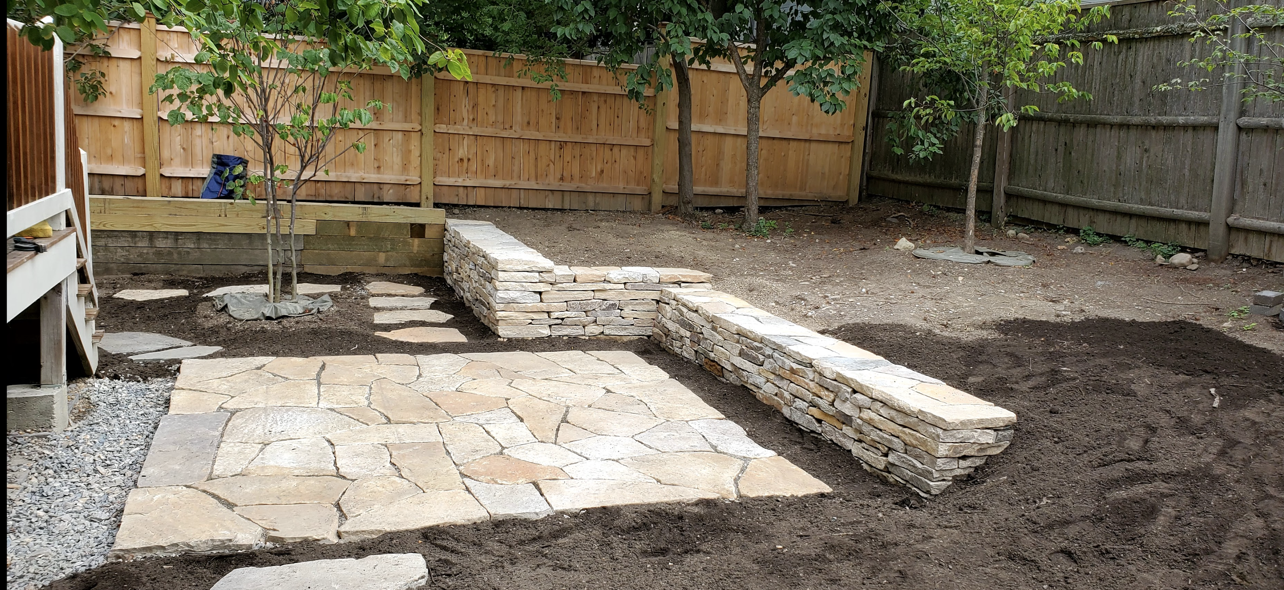 New retaining walls allowed us to create an upper planting area