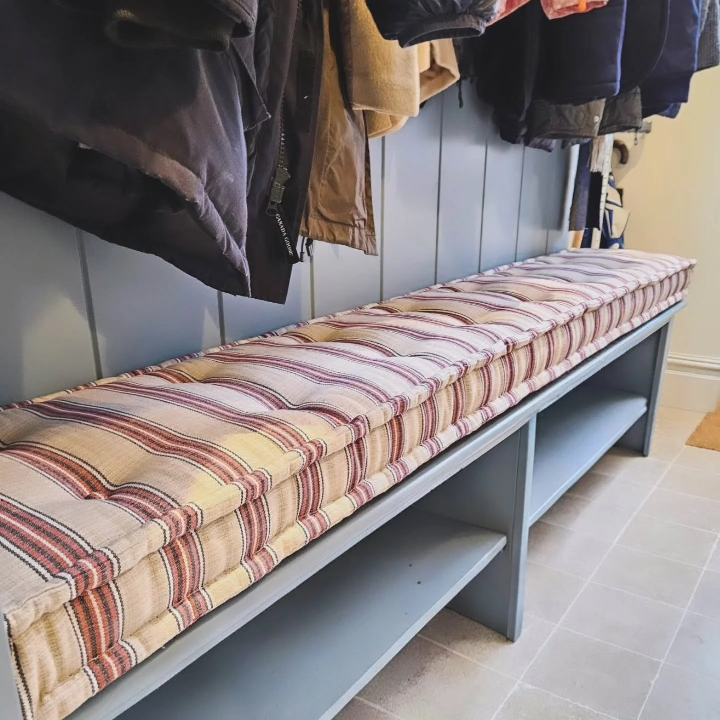 Traditional French mattress style bench cushion with fabric covered buttons made for this smart boot room.

#frenchmattress #bootroom #benchcushion #handmadeupholstery #countryfurnishings