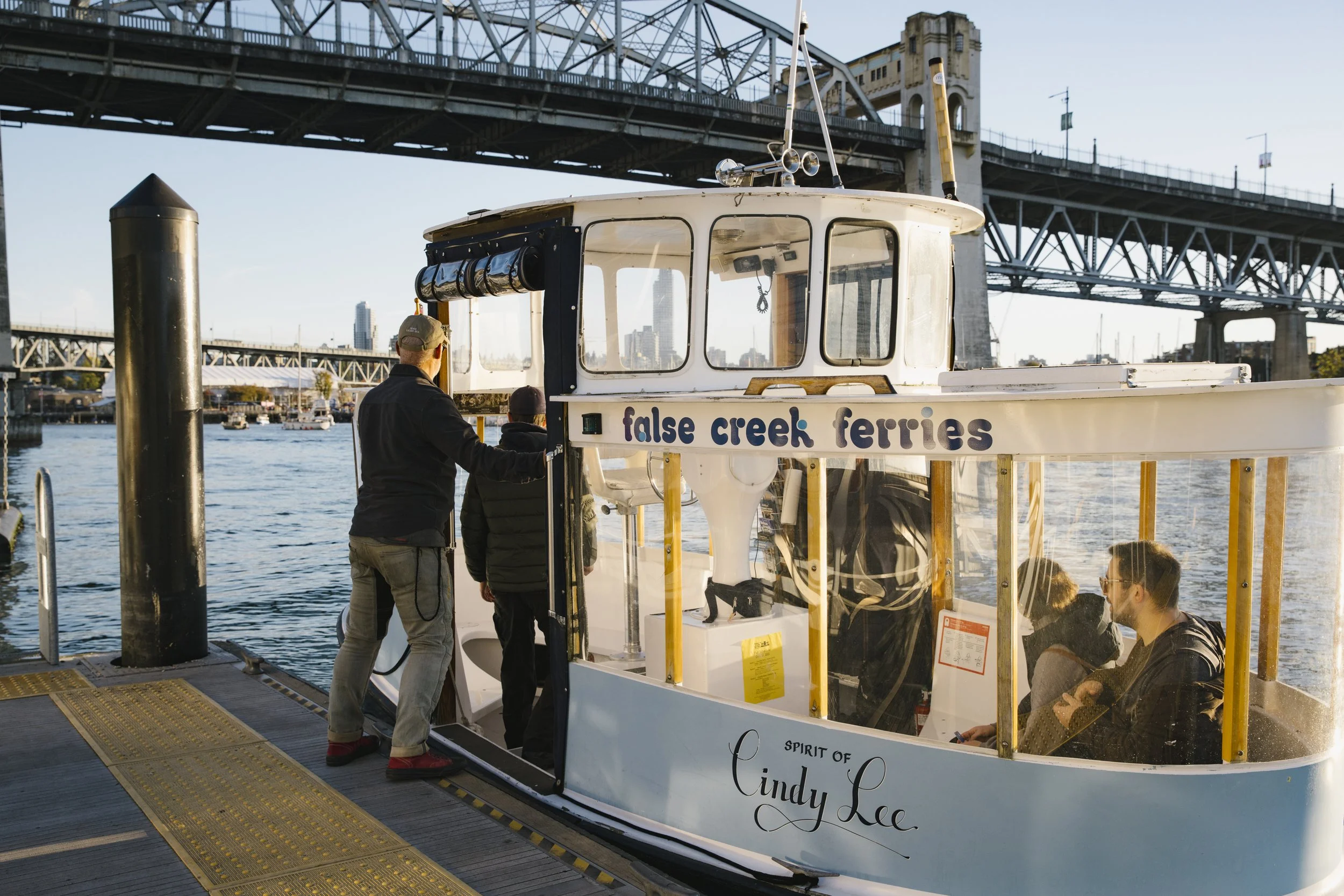 Passengers boarding the False Creek Ferry in Vancouver BC