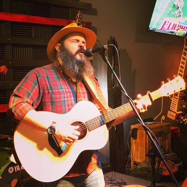 John at guitars and growlers in McKinney