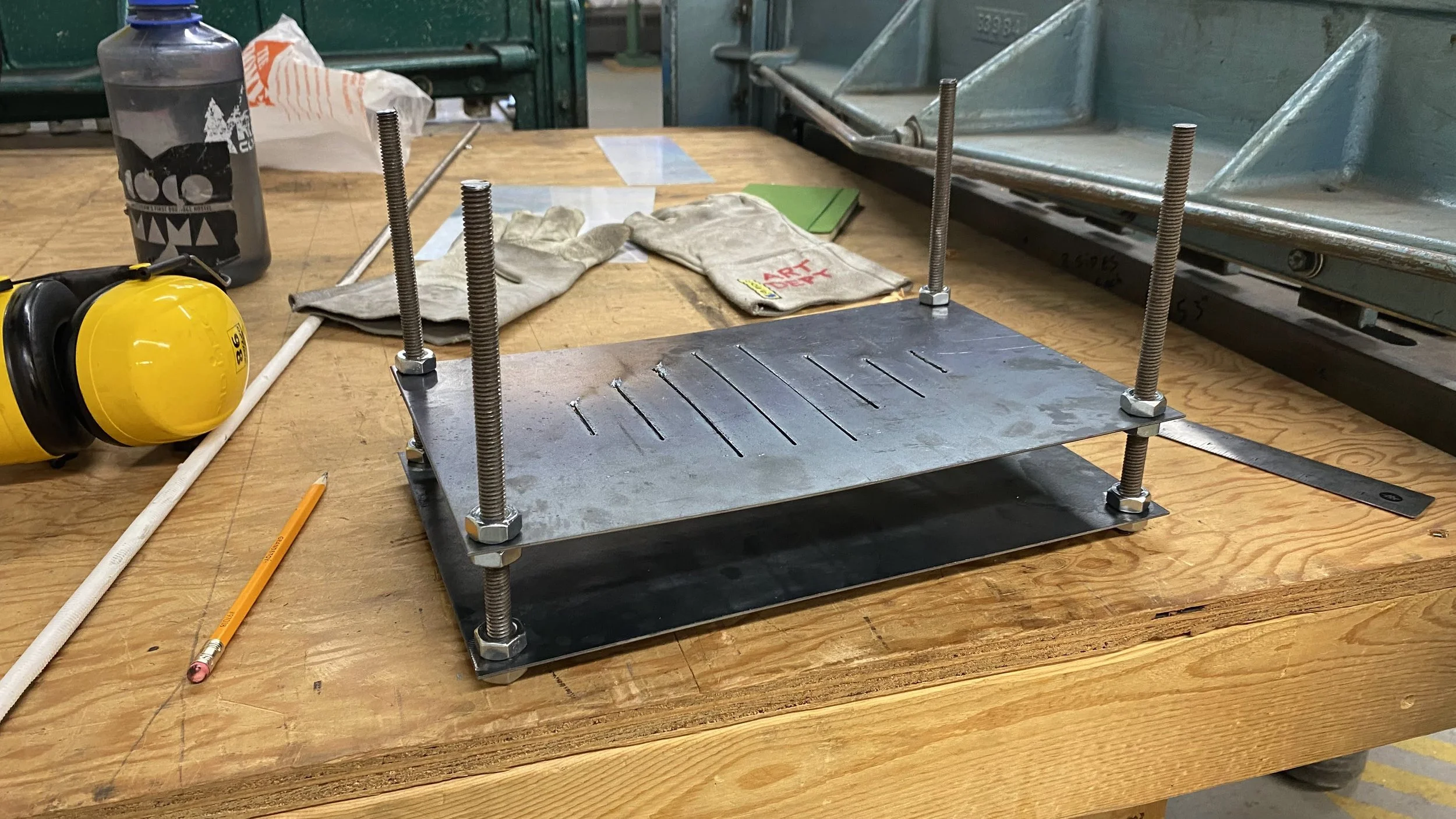 Blasting jig for The Double-slit Experiment, Revisited