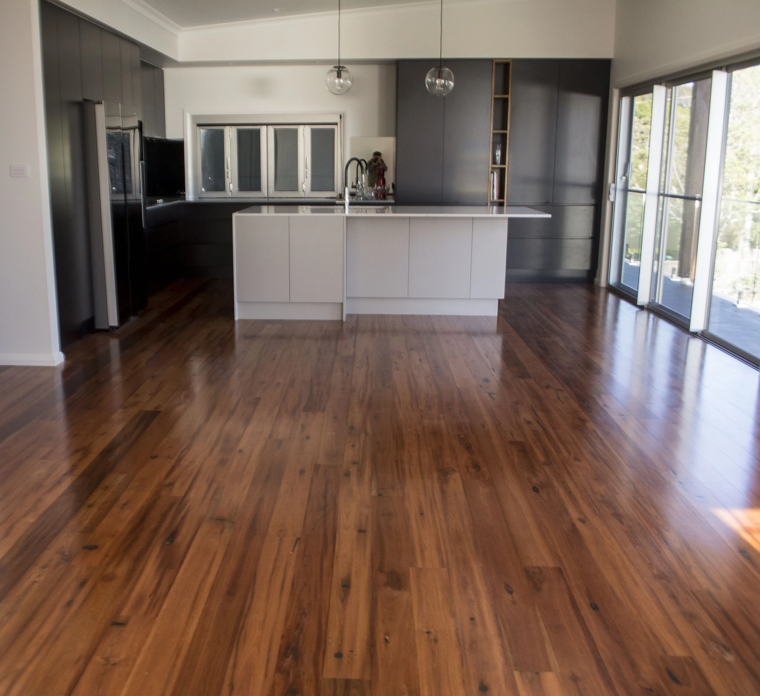 Polished to an almost mirror finish. Extremely hardwearing flooring.