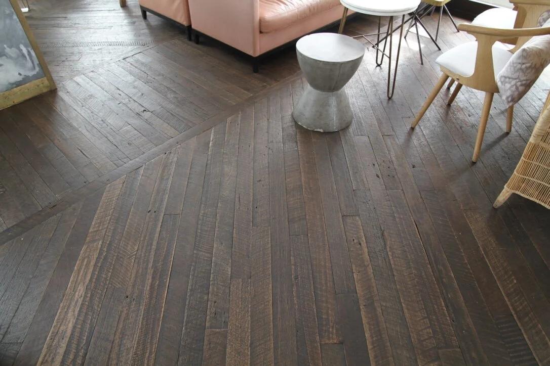 Recycled Hardwood flooring, grey wire brushed finish.