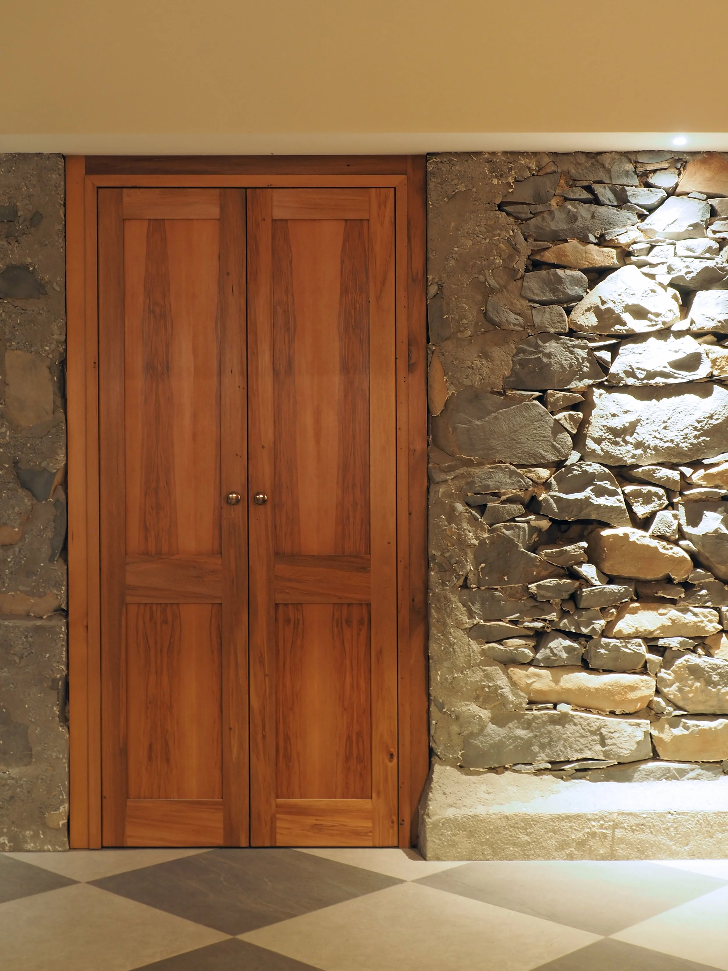 Chaplin Crooks Architects_Walnut Cottage_Stone wall and door made from salvaged timber.jpg