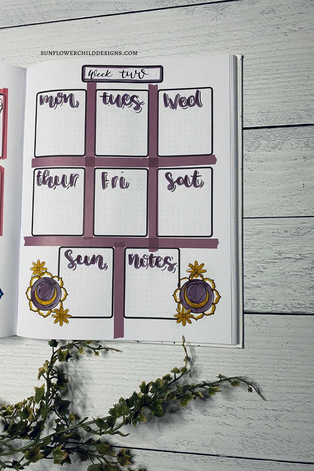 September weekly bullet journal spread featuring a chakra theme with purple washi tape accents and coordinating purple coloring for a cohesive layout.
