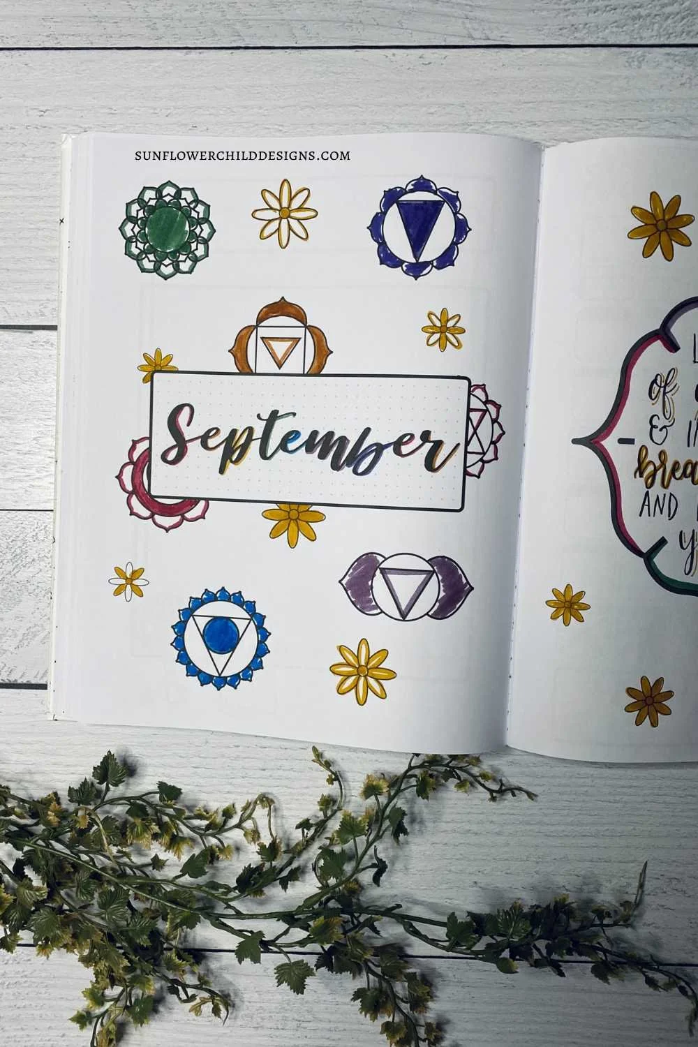 Chakra-themed September bullet journal cover page from a pre-printed witchy bullet journal. Aesthetic black and white design ready to color in.