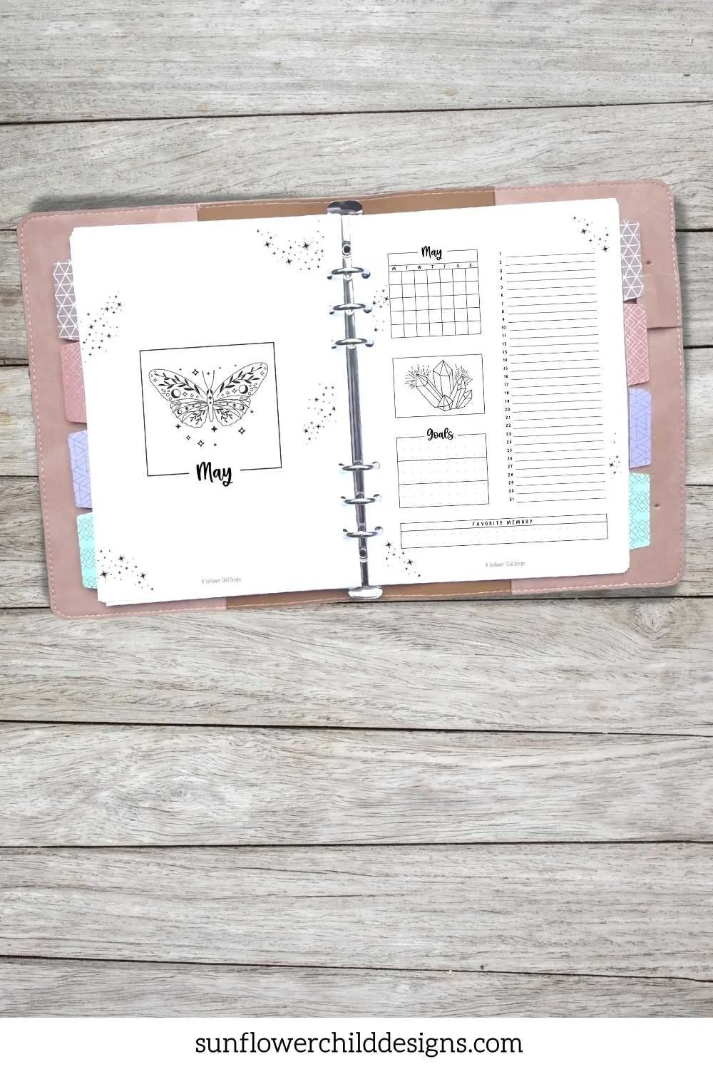 Witchy moon ritual journal pages displayed inside binder planner
