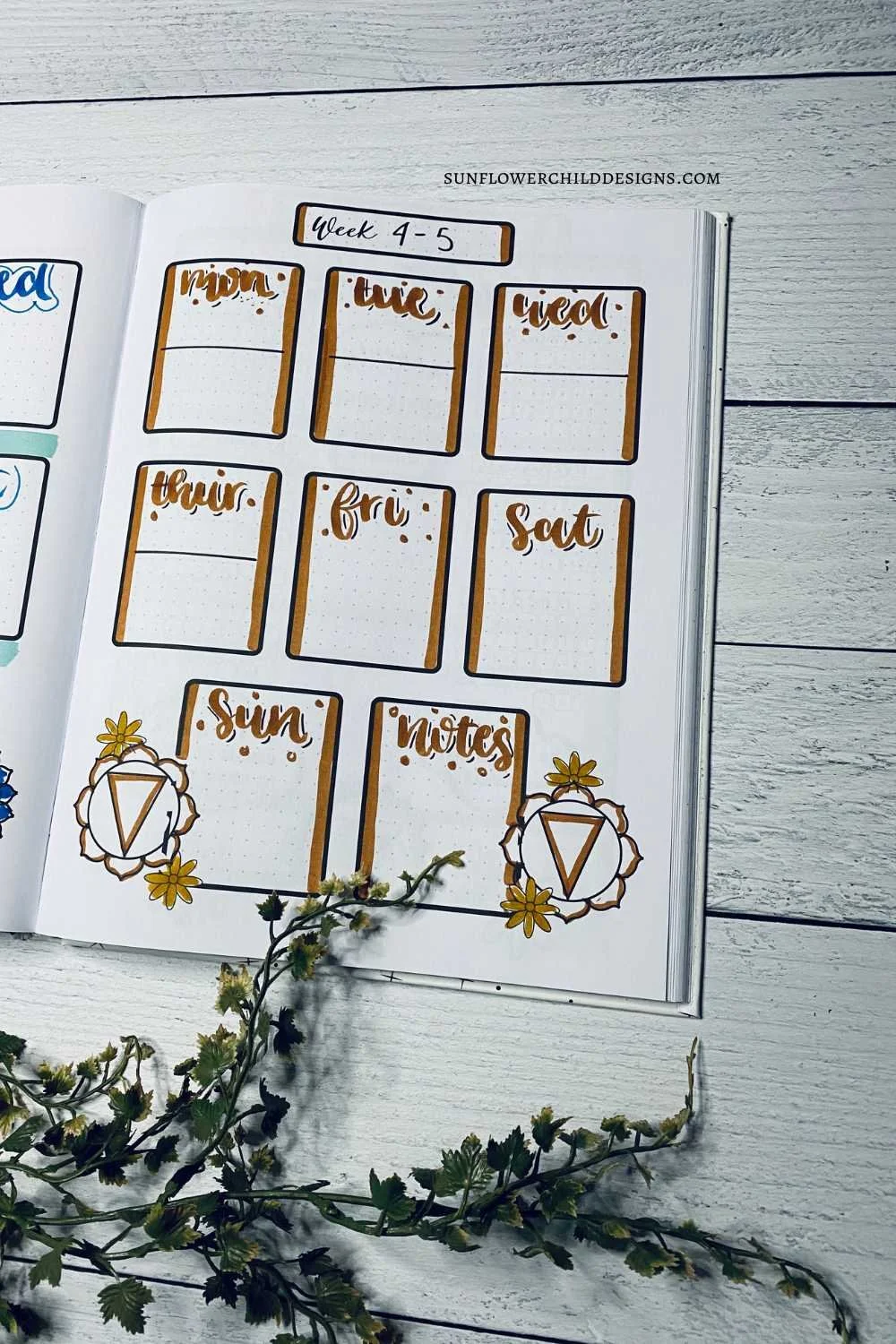 Close-up of week four in a September chakra-themed bullet journal, featuring warm brown tones and earthy accents for a grounded weekly layout.