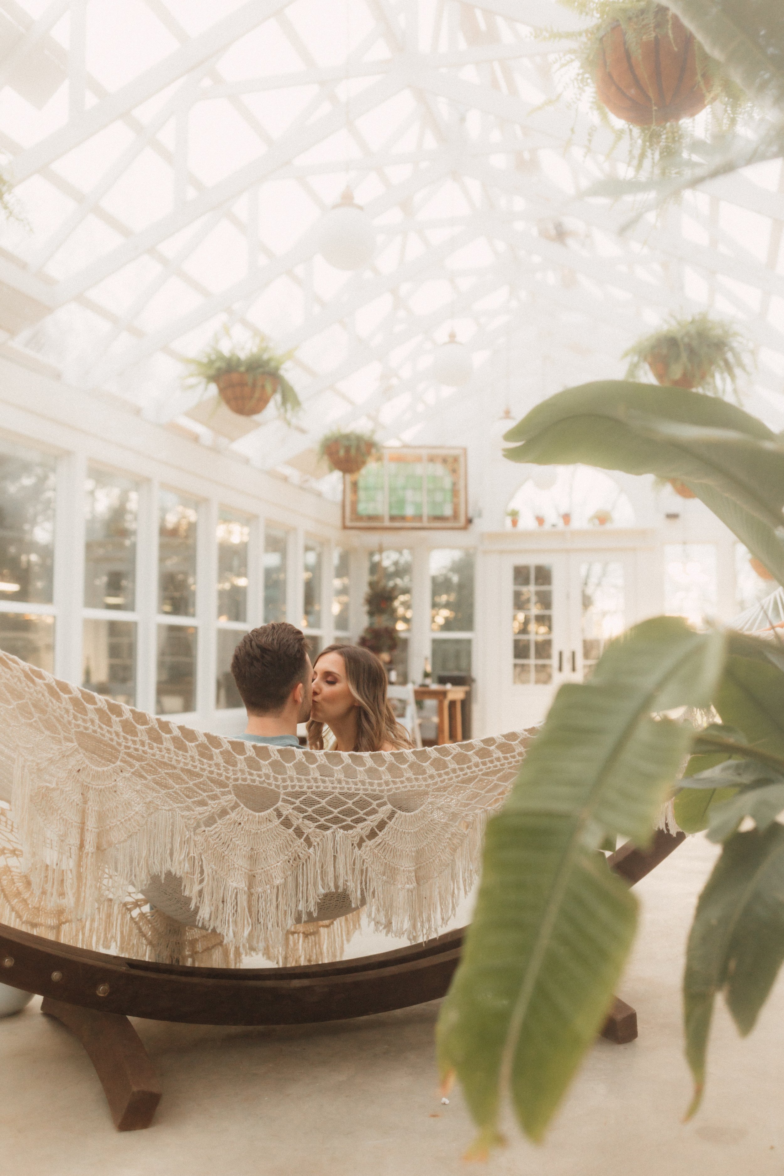 Laura_Ben_Engagment_Session_Winterset_Des_moines_Iowa_Couples_Photographer_Iris_Aisle_Cabin_Conservatory_Candid_Snow_Day_Winter_KMP_Photography-1080.jpg