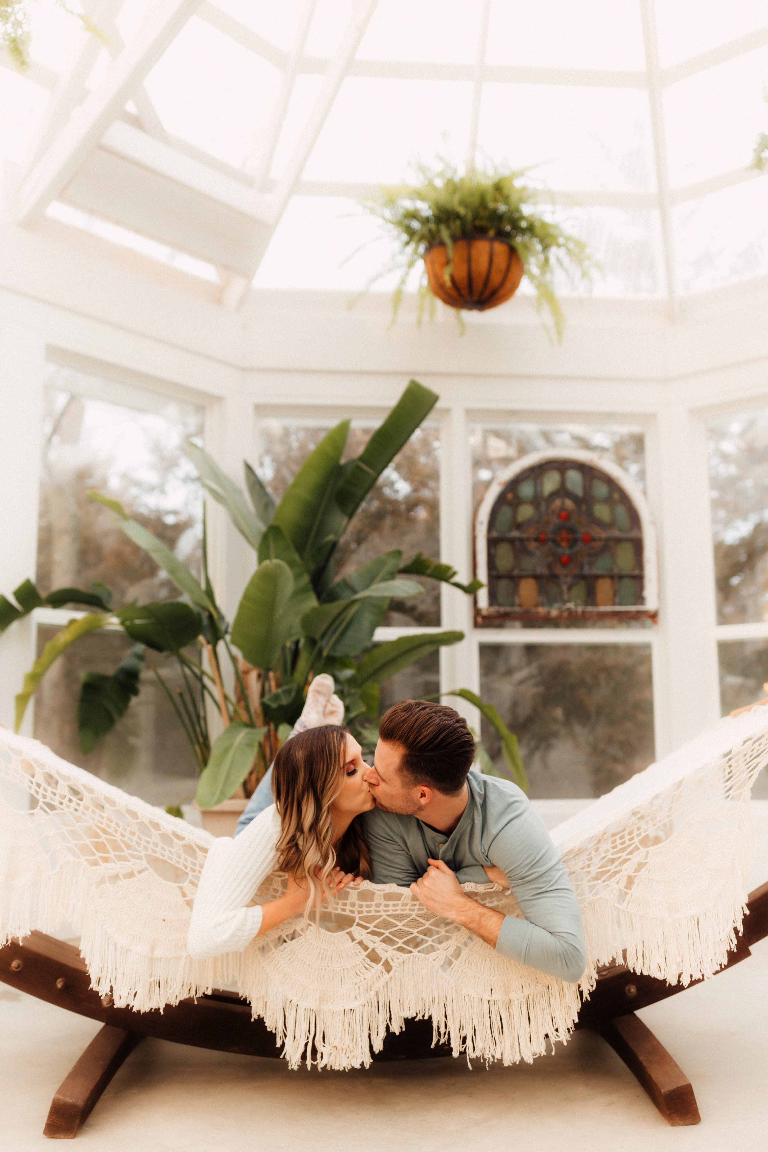 Laura_Ben_Engagment_Session_Winterset_Des_moines_Iowa_Couples_Photographer_Iris_Aisle_Cabin_Conservatory_Candid_Snow_Day_Winter_KMP_Photography-1285.jpg