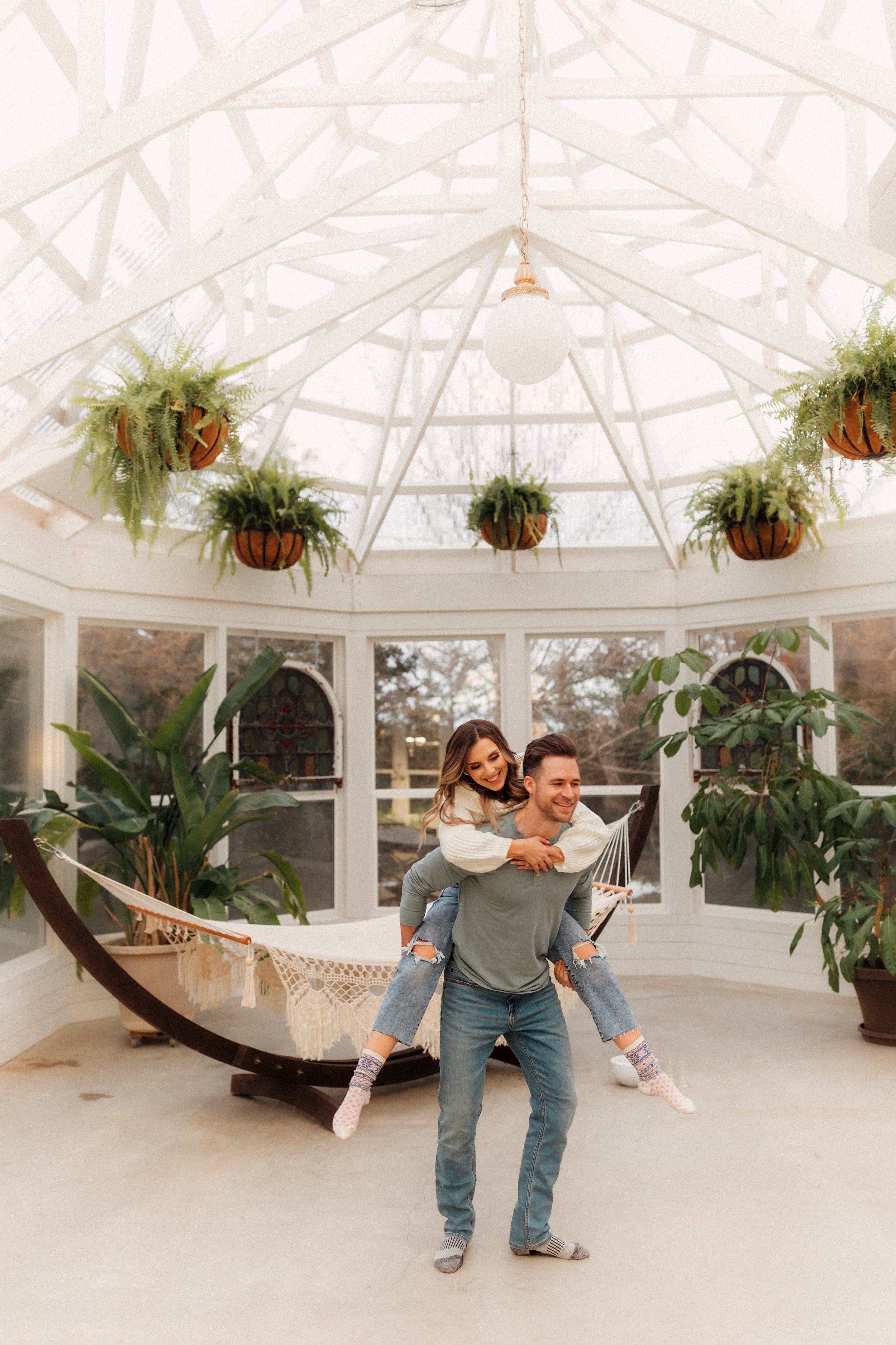 Laura_Ben_Engagment_Session_Winterset_Des_moines_Iowa_Couples_Photographer_Iris_Aisle_Cabin_Conservatory_Candid_Snow_Day_Winter_KMP_Photography-1340.jpg