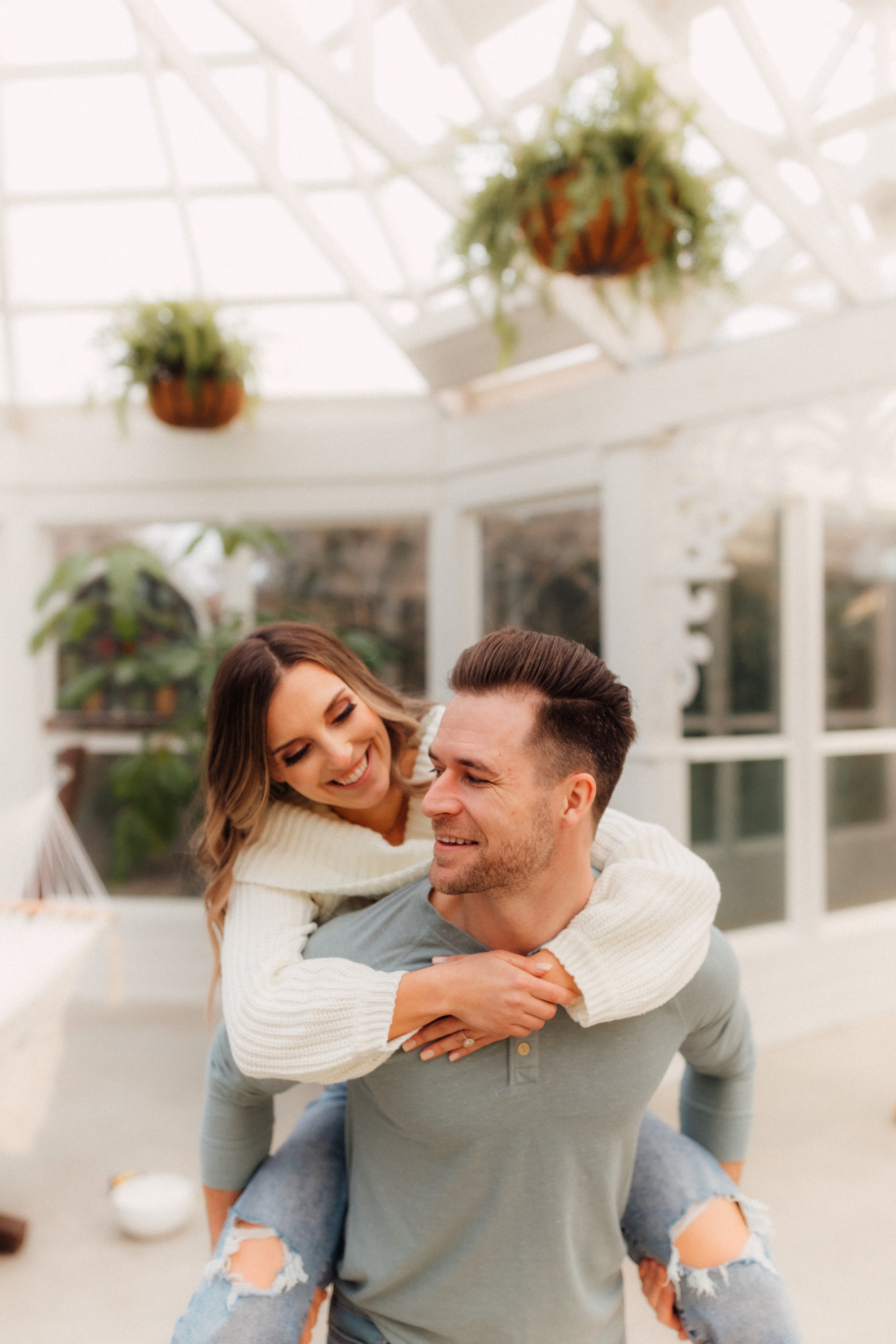 Laura_Ben_Engagment_Session_Winterset_Des_moines_Iowa_Couples_Photographer_Iris_Aisle_Cabin_Conservatory_Candid_Snow_Day_Winter_KMP_Photography-1396.jpg