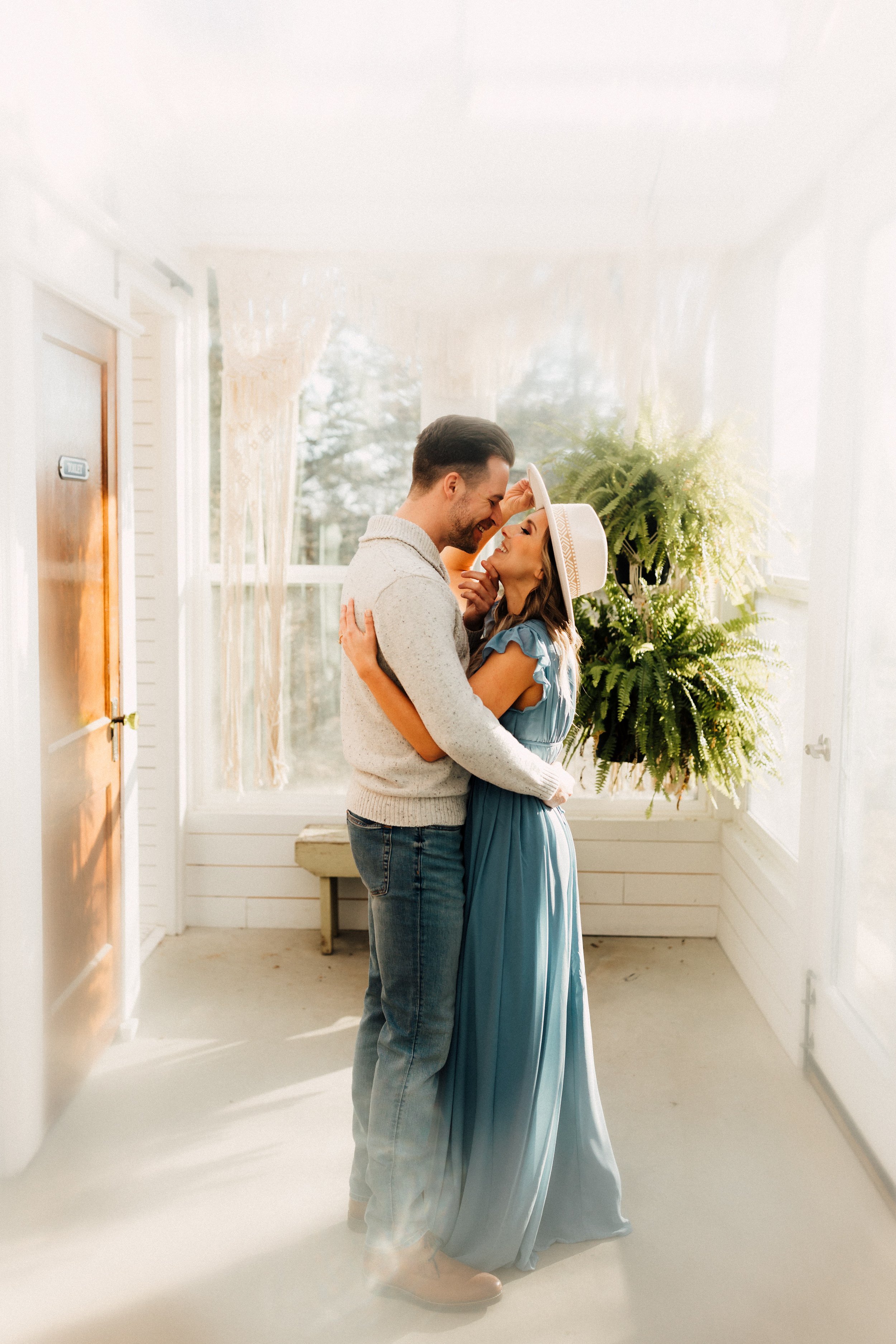 Laura_Ben_Engagment_Session_Winterset_Des_moines_Iowa_Couples_Photographer_Iris_Aisle_Cabin_Conservatory_Candid_Snow_Day_Winter_KMP_Photography-9039.jpg