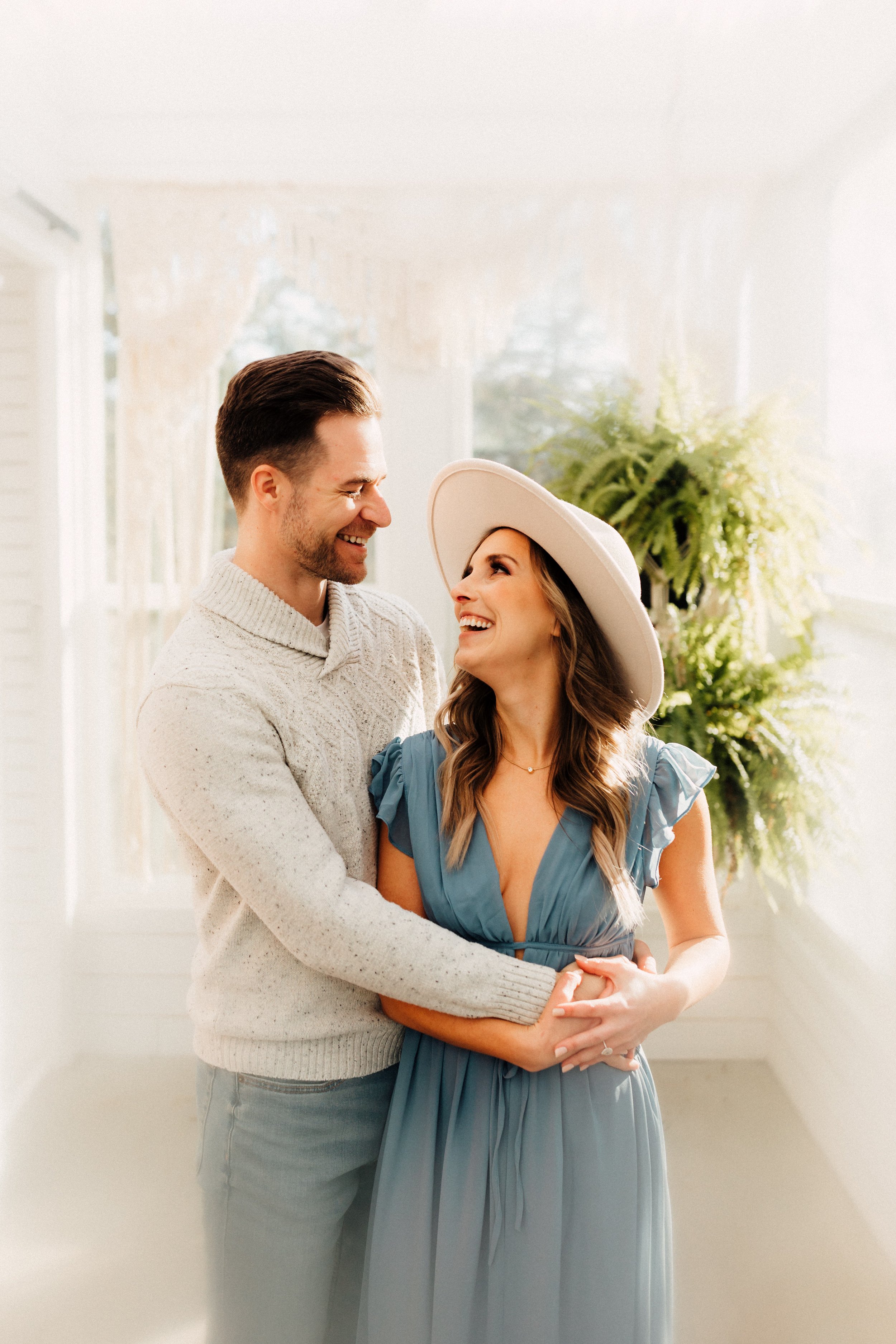 Laura_Ben_Engagment_Session_Winterset_Des_moines_Iowa_Couples_Photographer_Iris_Aisle_Cabin_Conservatory_Candid_Snow_Day_Winter_KMP_Photography-9063.jpg