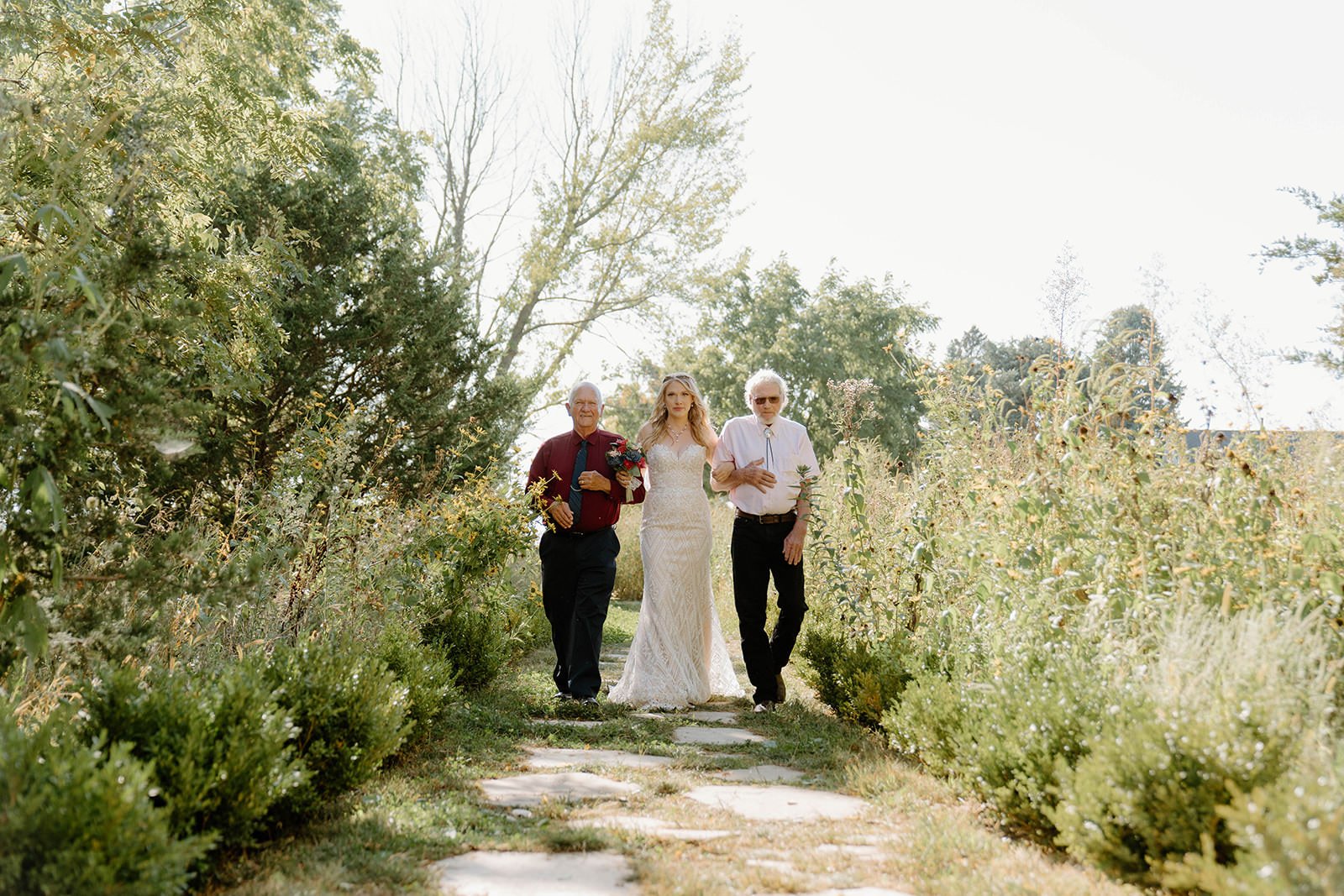 cabrie-matt-micro-wedding-iris-aisle-winterset-iowa-raelyn-ramey-photography-30.jpg