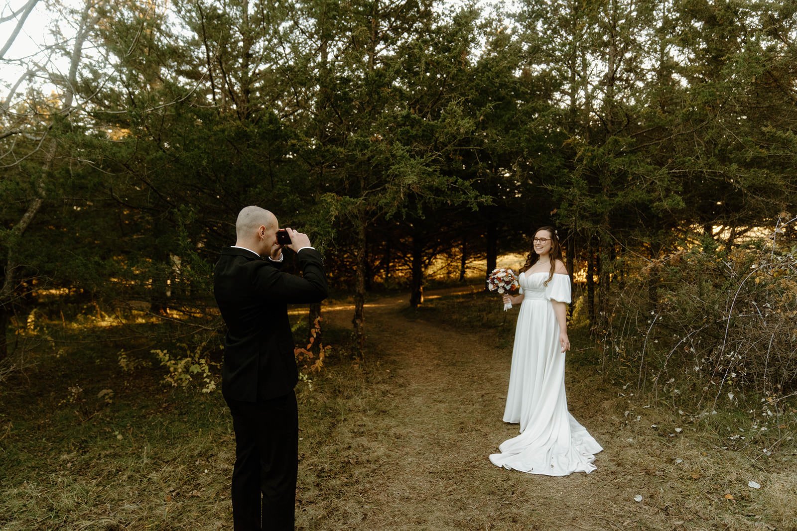 madaline-mikia-wedding-iris-aisle-winterset-iowa-raelyn-ramey-photography-313.jpg