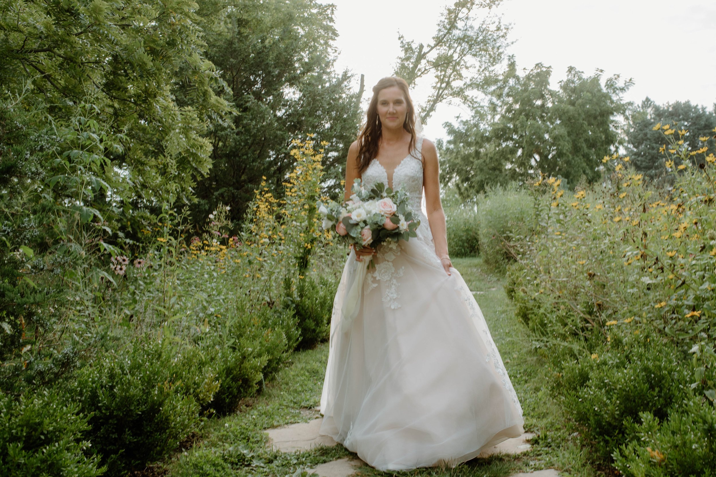 rochelle-neal-micro-wedding-iris-aisle-winterset-iowa-raelyn-ramey-photography-28.jpg