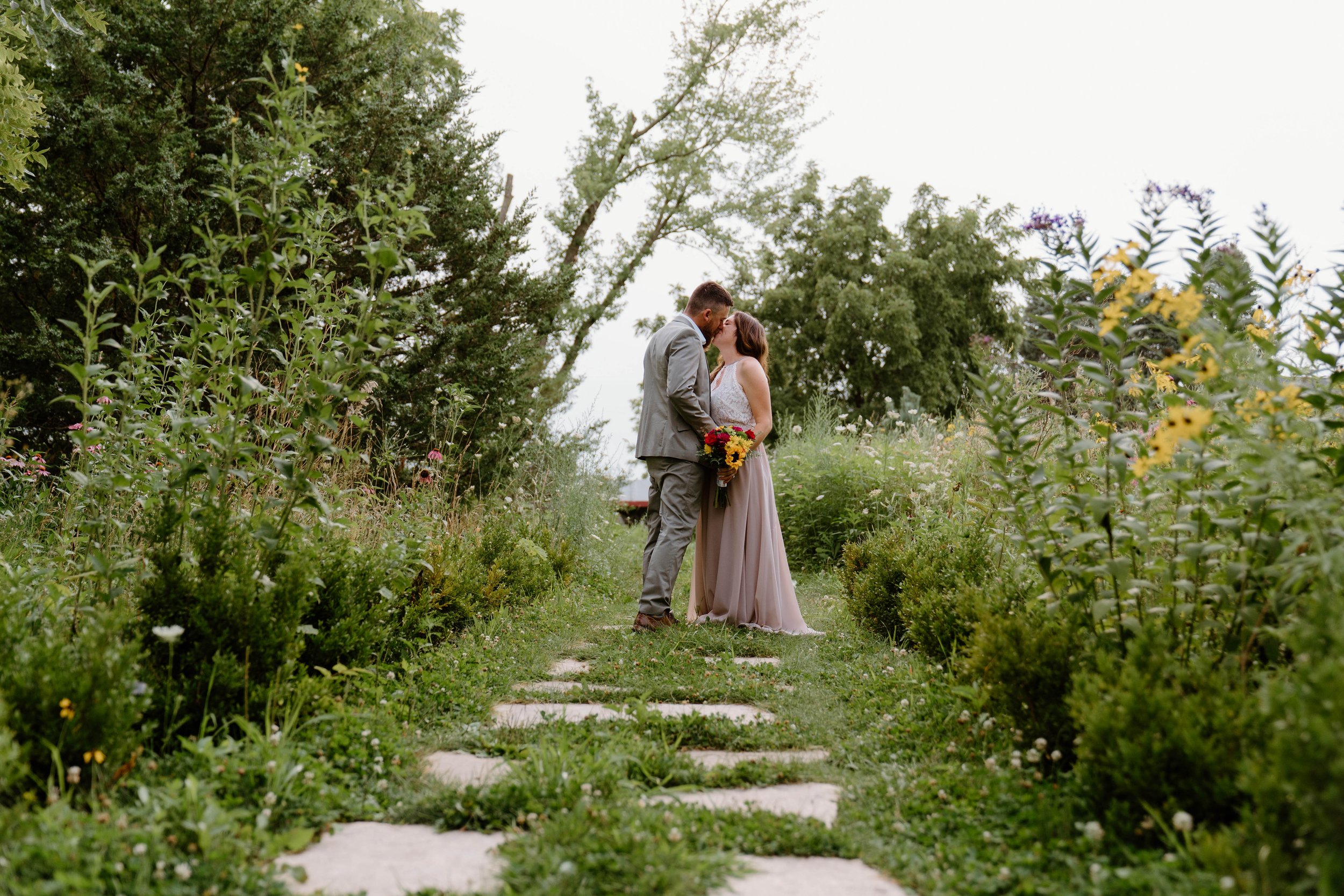 leanna-travis-elopement-iris-aisle-winterset-iowa-raelyn-ramey-photography-70.jpg